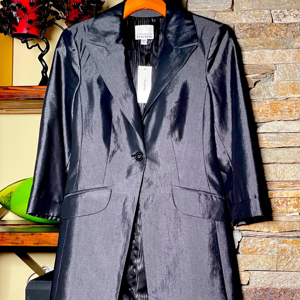 Brand new Bebe Kardashian shiny satin jacket, elegant, chic, and flattering fit.